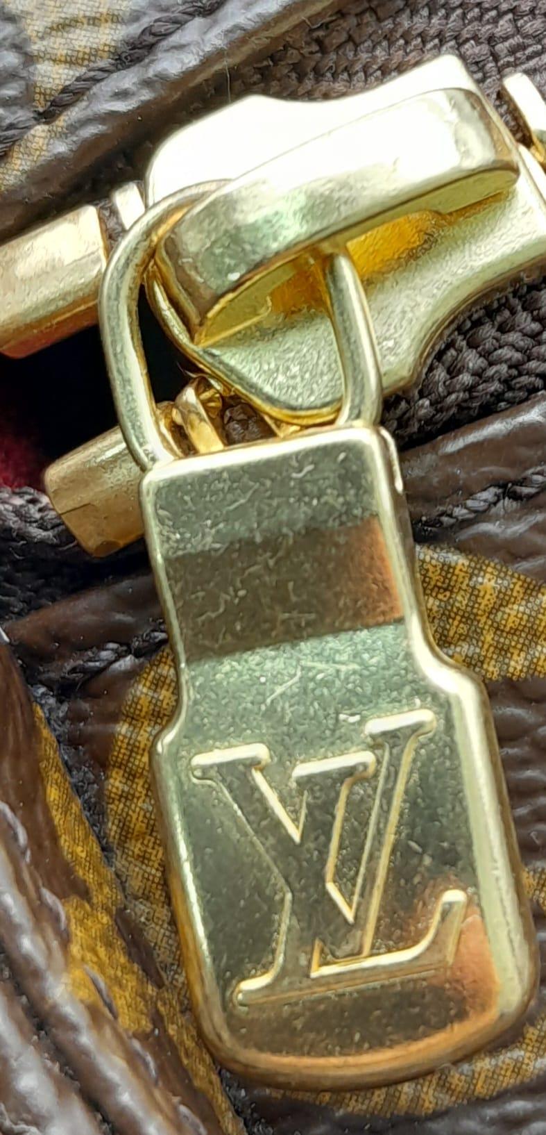 A Louis Vuitton Monogram Multiple Cite Bag. Leather exterior with gold hardware and top zip. Two - Image 10 of 10