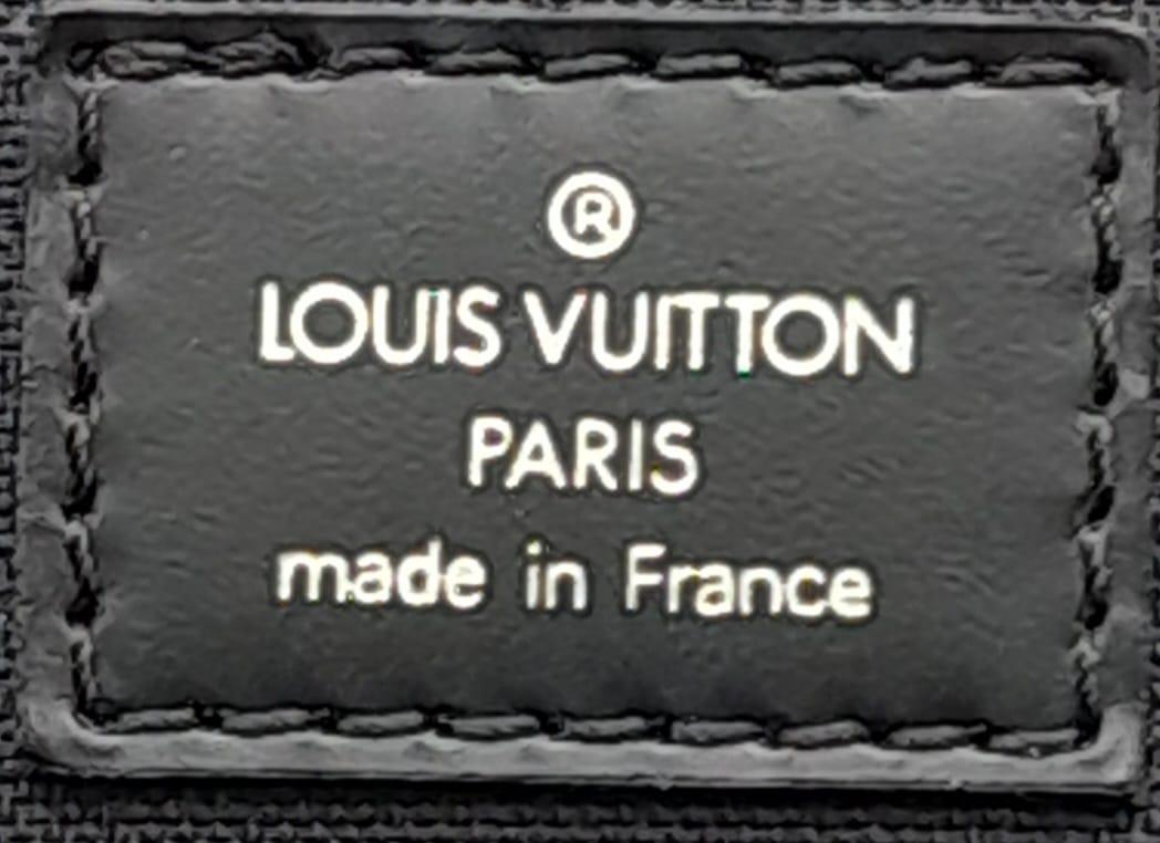 A Louis Vuitton Black Odessa Laptop Bag. Taiga leather exterior with two pockets, handle on the top. - Image 8 of 10