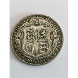 SILVER HALF CROWN 1923 in Extra fine condition, having clear detail and raised definition.