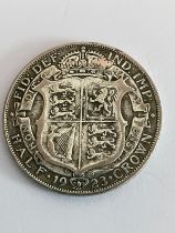 SILVER HALF CROWN 1923 in Extra fine condition, having clear detail and raised definition.