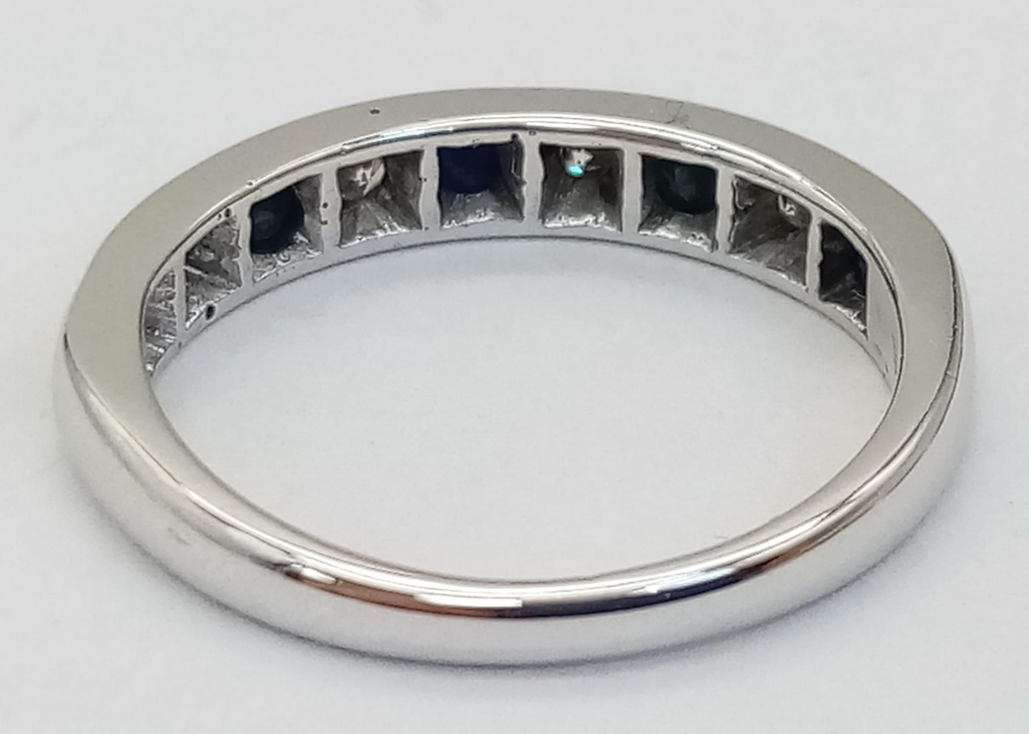 AN 18K WHITE GOLD DIAMOND & SAPPHIRE HALF ETERNITY RING. Size L/M, 3.2g total weight. - Image 3 of 4