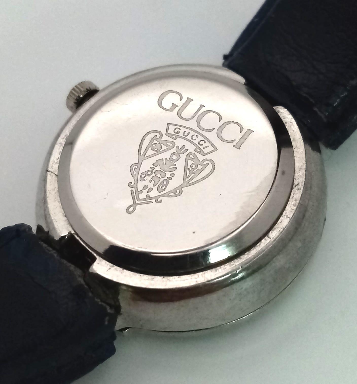 A Designer Gucci Quartz Ladies Watch. Blue leather and steel bracelet. Circular stainless steel case - Image 6 of 6