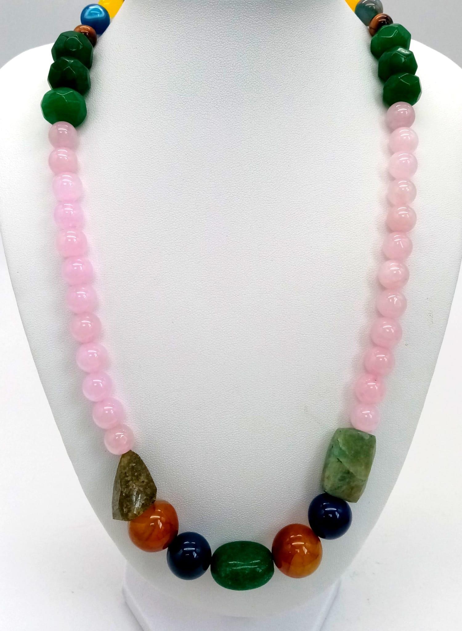 A Mixed Gemstone Bead Necklace. Mixed colours and shapes. Jade, rose quartz, agate, and tigers