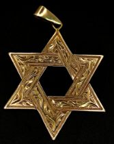 A 14K Yellow Gold Star of David Pendant. 5.5cm. 7.45g weight.