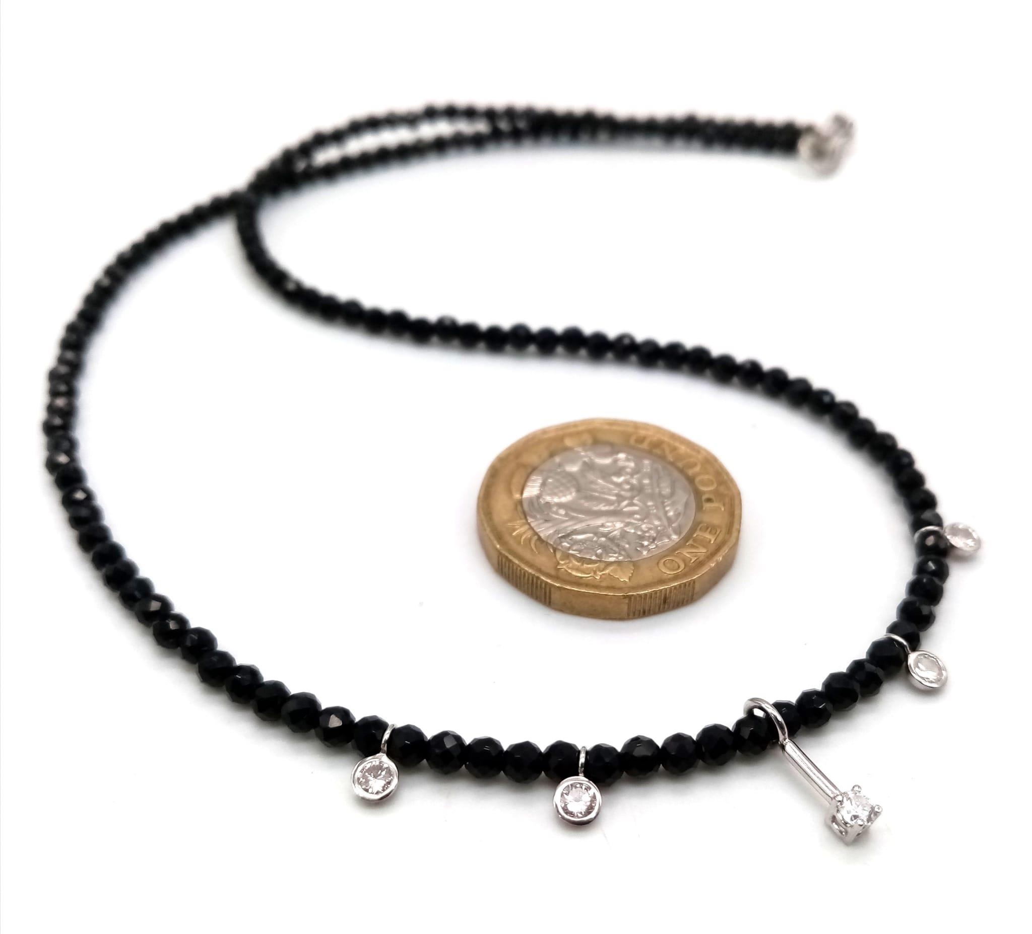 A Black Spinel Small Bead Necklace with Five Stone White Diamond Decoration. 0.5ctw. 14k gold clasp. - Image 4 of 5