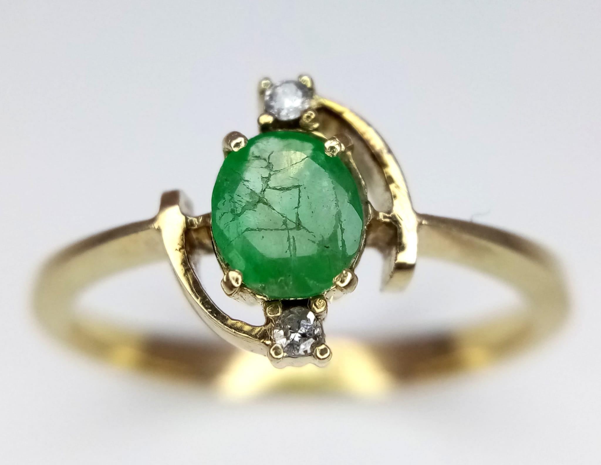 A Vintage 14K Yellow Gold Emerald and Diamond Ring. Size O. 2.05g total weight. - Image 2 of 4