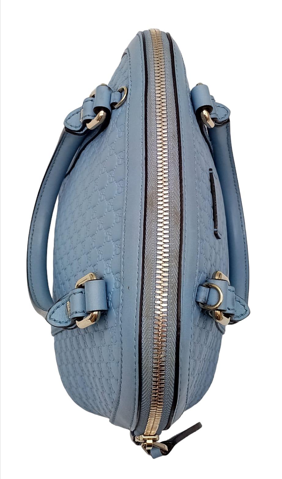 A Gucci Cornflower Blue Micro Guccisima Dome Bag. Monogram leather exterior with rolled leather - Image 7 of 11