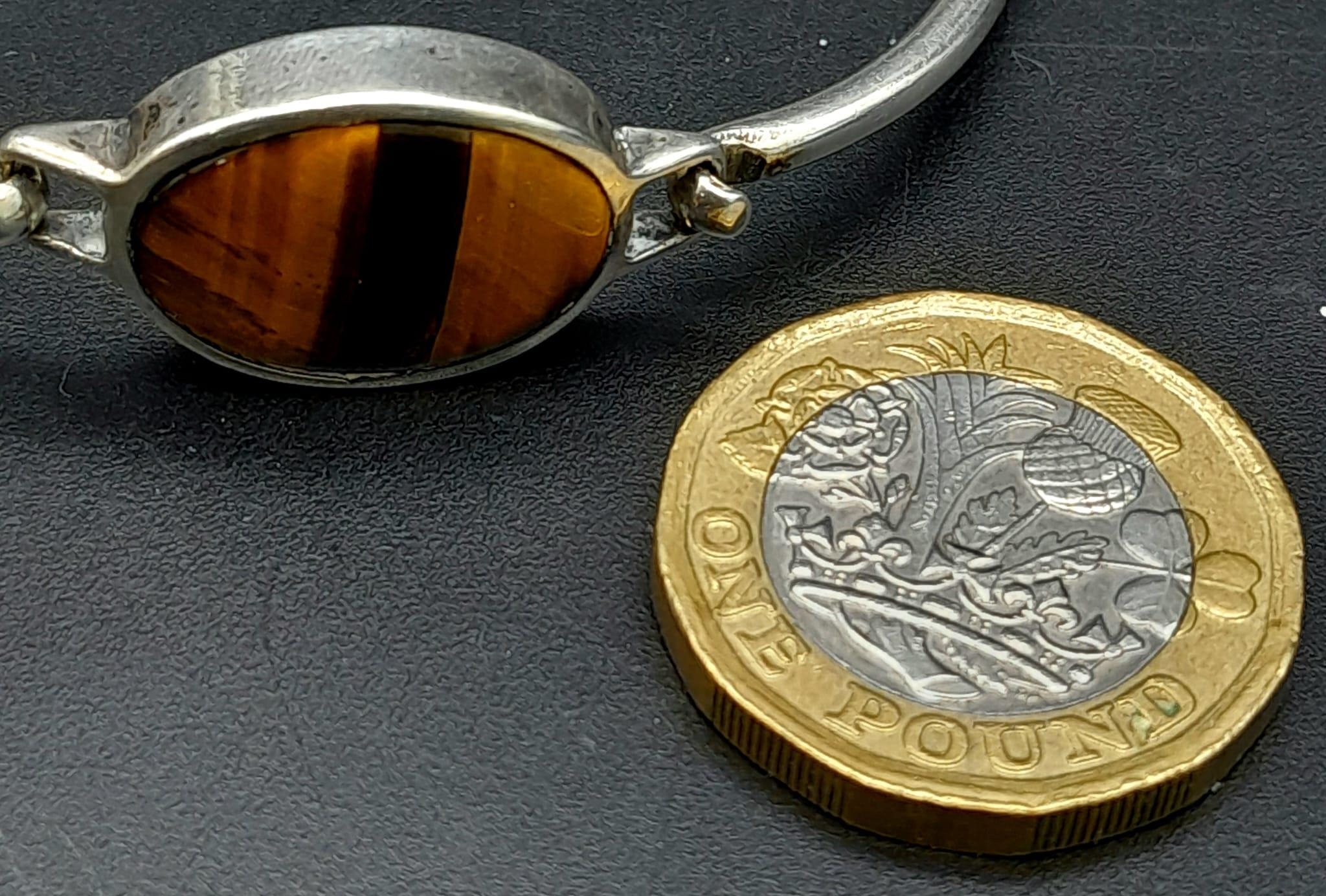 A Vintage Silver Tigers Eye Bracelet stamped Gucci and 800 Silver. 6cm Inner Width, Set with Oval - Image 4 of 7