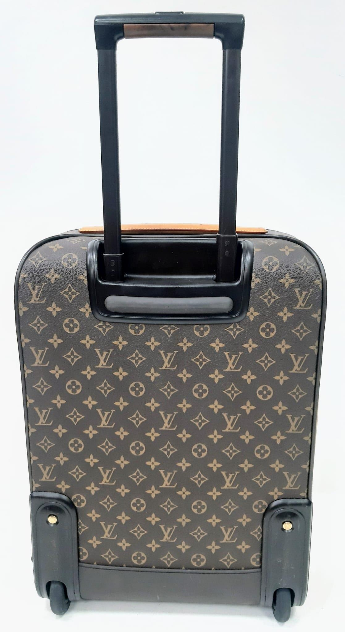 A Louis Vuitton Monogram Pegase Suitcase. Durable leather exterior. Front compartment with zipper, - Image 3 of 9