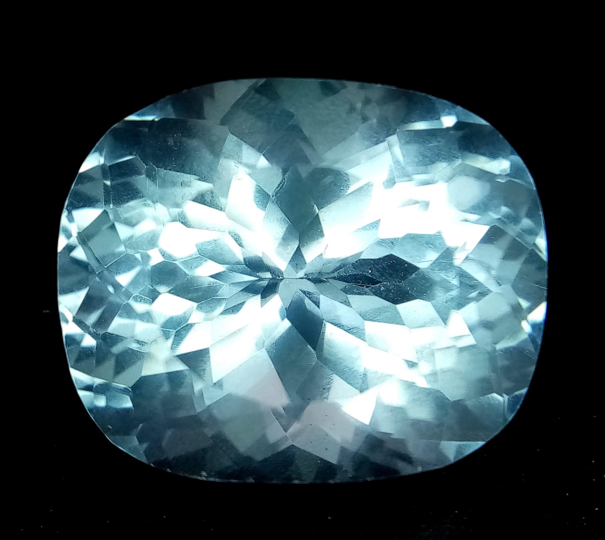 A 20ct Mesmerizing Blue Aquamarine Gemstone. Square -cut with a trillion base. This faceted gem