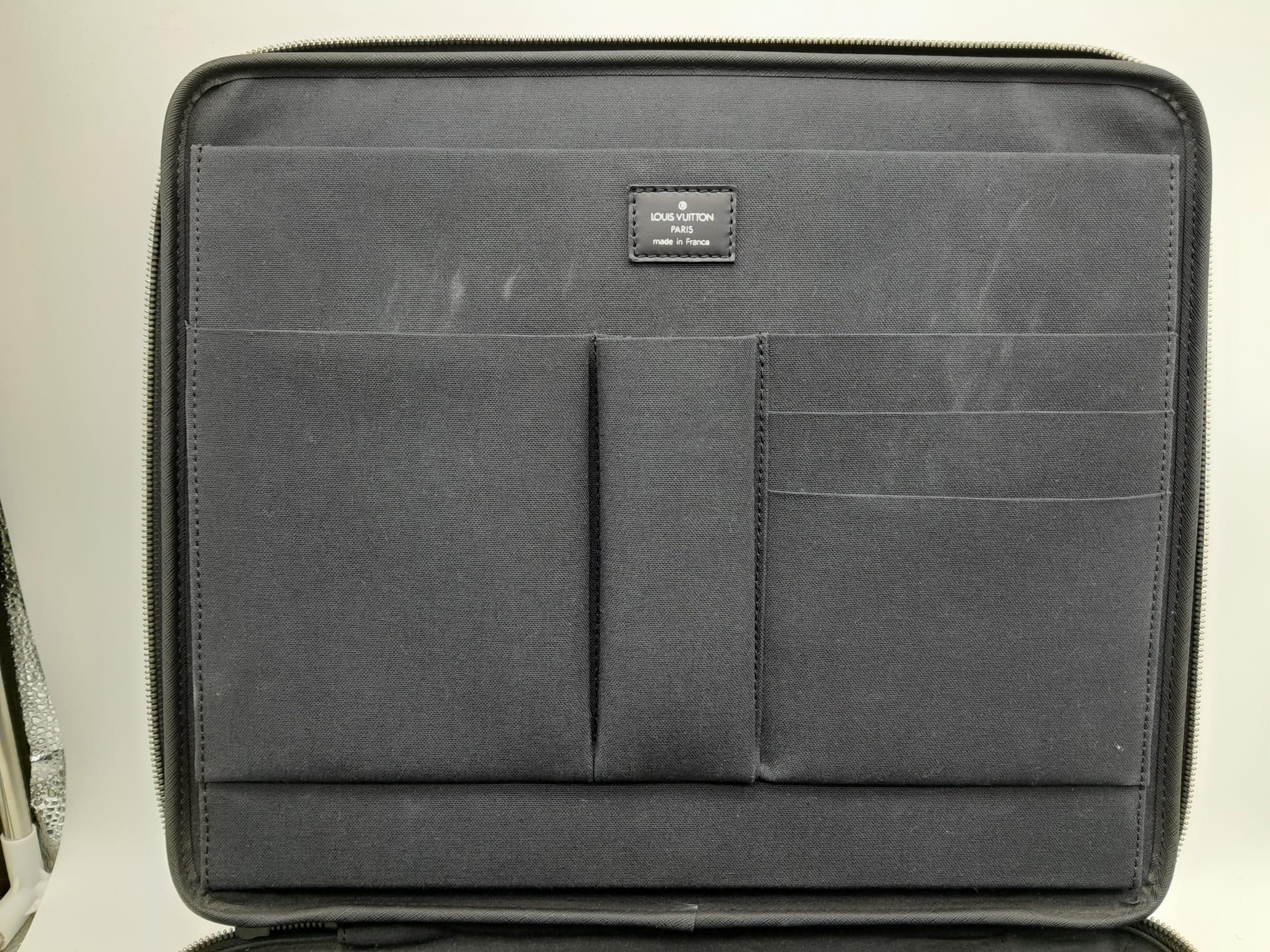 A Louis Vuitton Black Odessa Laptop Bag. Taiga leather exterior with two pockets, handle on the top. - Image 3 of 10