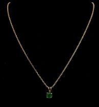 A 14k Yellow Gold Emerald Pendant on a 14k Yellow Gold Necklace. 12mm and 46cm. 2.53g total weight.