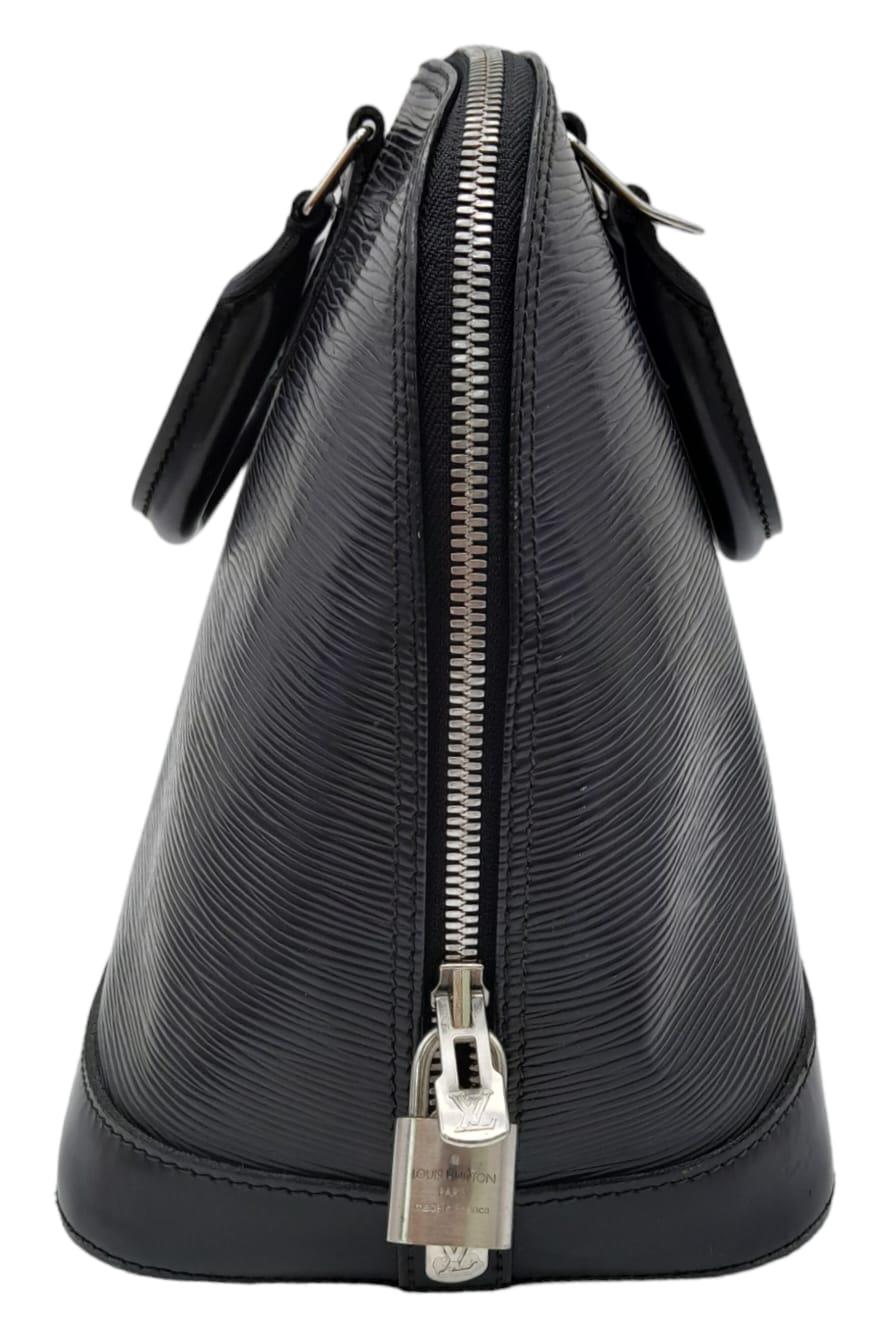 A Louis Vuitton Black 'Alma' Bag. Epi leather exterior with rolled handles, and silver-tone - Image 3 of 10