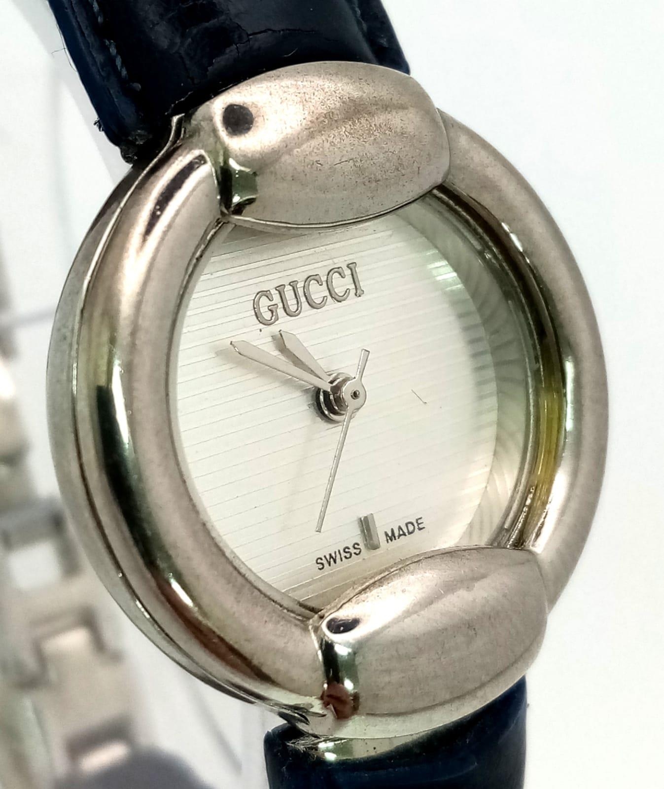 A Designer Gucci Quartz Ladies Watch. Blue leather and steel bracelet. Circular stainless steel case - Image 3 of 6