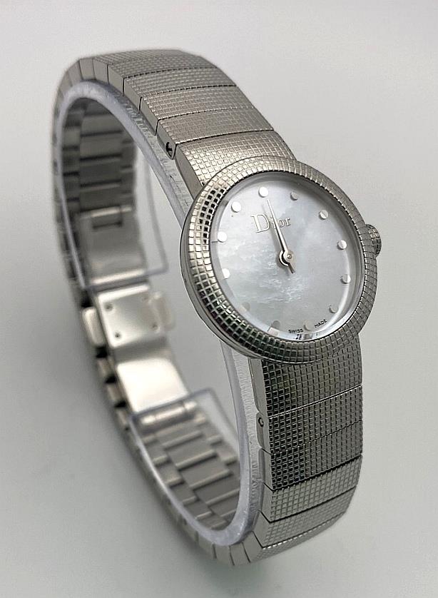A Designer Christian Dior Quartz Ladies Watch. Stainless steel bracelet and case - 23mm. White dial.