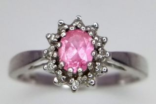 9k white gold diamond and pink sapphire ring. Weight: 2.2g Size: M (dia:0.12ct/sapp:0.40ct)