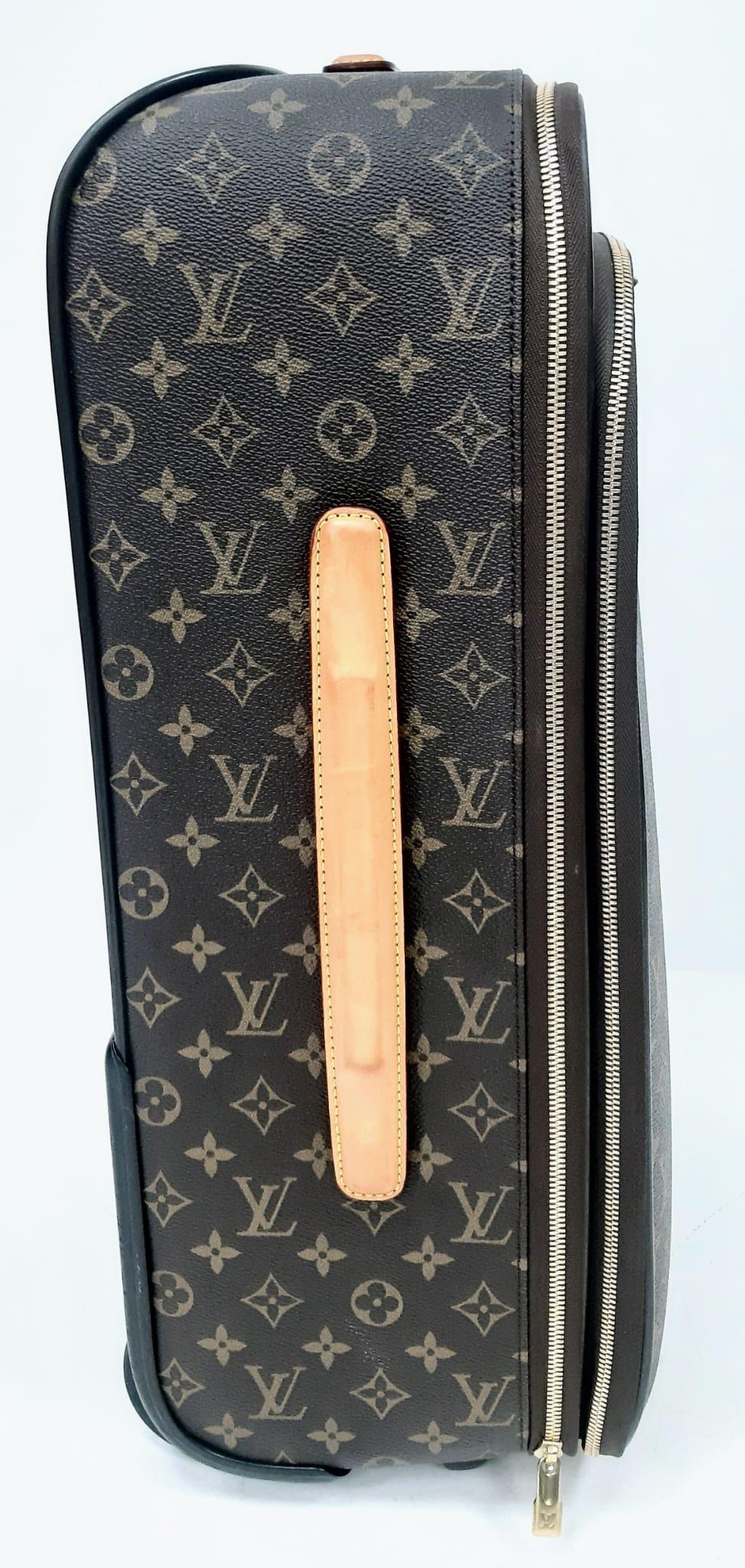 A Louis Vuitton Monogram Pegase Suitcase. Durable leather exterior. Front compartment with zipper, - Image 4 of 9