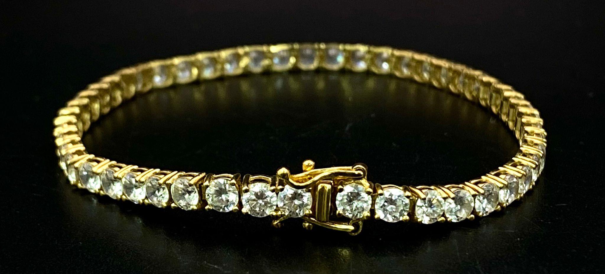 A STUNNING 14K GOLD TENNIS BRACELET WITH BRIGHT SPARKLING ZIRCONIA STONES. 9.8gms - Image 3 of 5