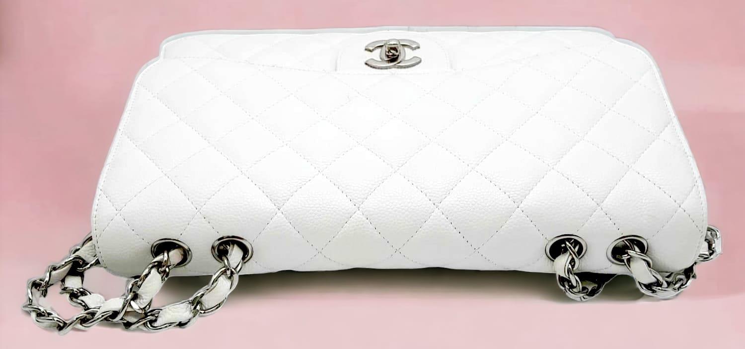 An exquisite Chanel White Caviar Classic Flap Bag. The interior is lined in a tonal leather, care - Image 4 of 11