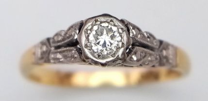 An 18K Yellow Gold and Platinum Diamond Solitaire Ring. Size K. 2.03g total weight.