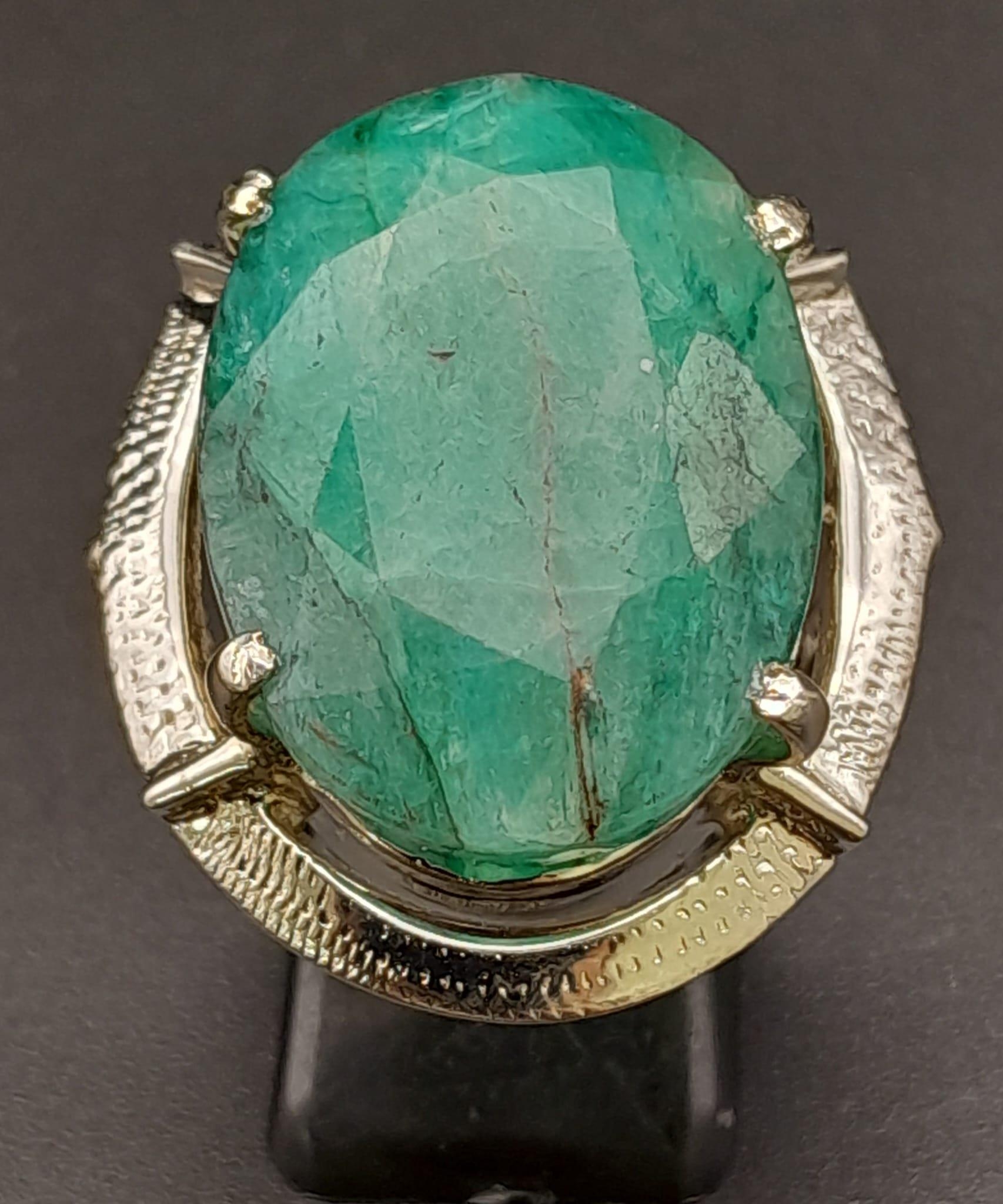 A 50ct Brazilian Oval Cut Emerald Ring. Set in 925 Sterling Silver. Size P. Comes with a - Image 2 of 7