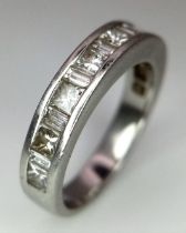 A 950 Platinum Diamond Half Eternity Ring. 17 diamonds - 0.98ctw. Size L. 6.15g total weight. Ref:
