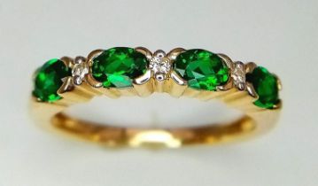 A 9K YELLOW GOLD DIAMOND & GREEN STONE RING. Size M, 2.2g total weight.