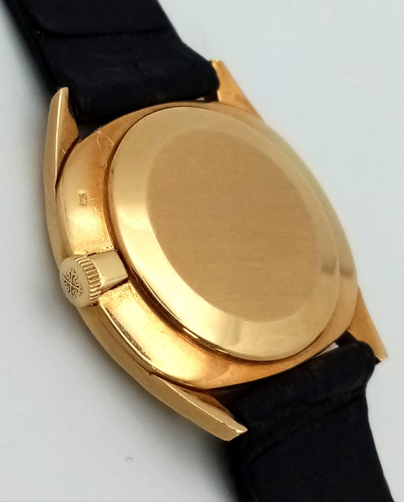 A Vintage Patek Philippe 18K Gold Watch. Black leather strap - 18k gold buckle. 18k gold case - - Image 5 of 6