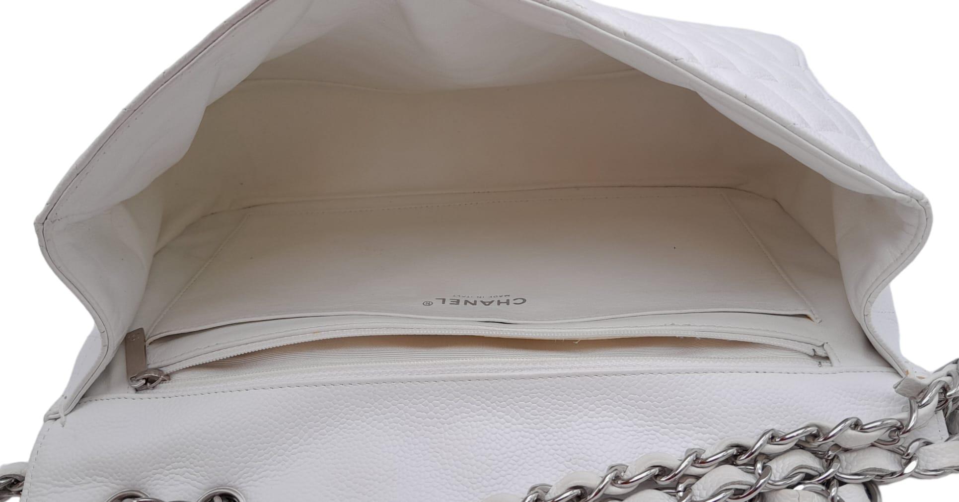 An exquisite Chanel White Caviar Classic Flap Bag. The interior is lined in a tonal leather, care - Image 7 of 11