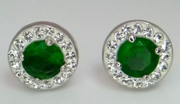 Beautiful pair of Swarovski Crystal & Green Gem stud earrings. Still within the original Swarovski