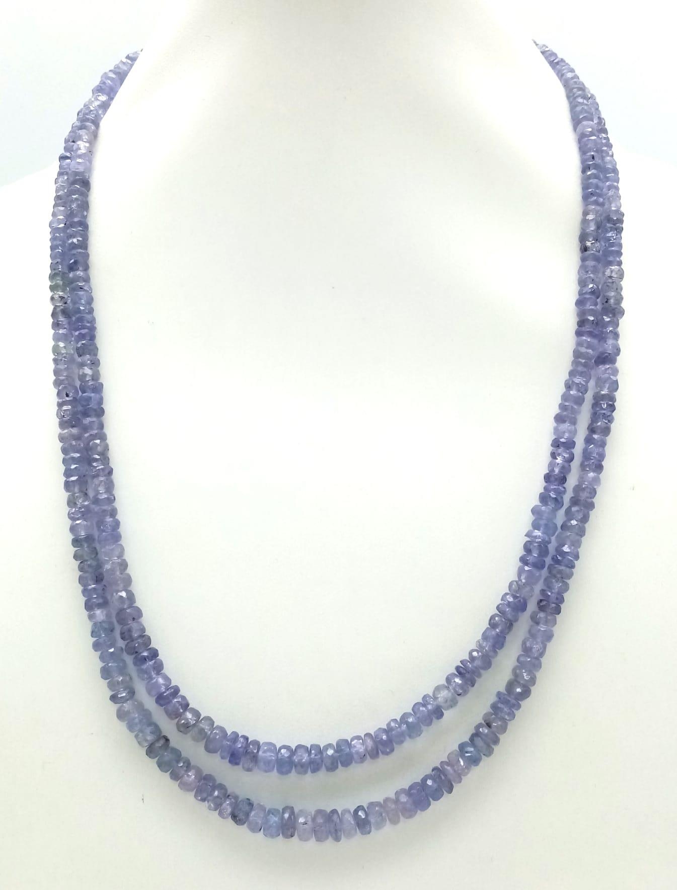 A Two Row Tanzanite Gemstone Necklace with an Emerald and 925 Silver Clasp. 45cm in length, 175ctw - Image 3 of 6