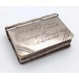 An Edwardian Sprung Lid Combination Vesta and Stamp Holder in the form of a Book by CED & Co. Reg