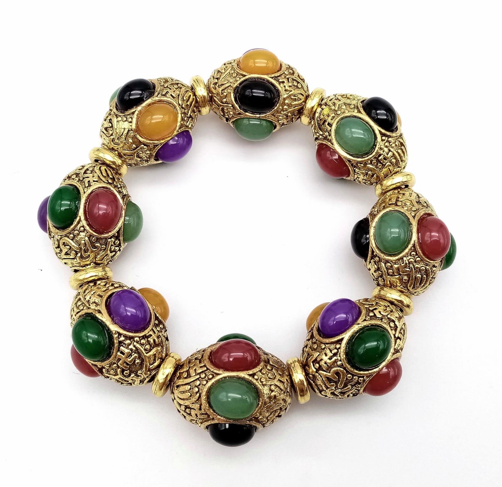 A Gilded Tibetan Style Bracelet with Multi-Colour Jade Cabochon Decoration. Gilded spacers. - Image 2 of 4