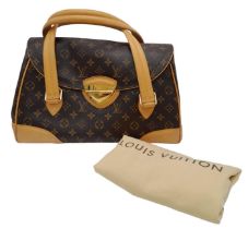 A Louis Vuitton Monogram 'Beverly' Bag. Leather exterior with vachette trim and gold-tone