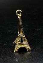A 9K Yellow Gold Eiffel Tower Pendant/Charm. 25mm. 1.45g weight.