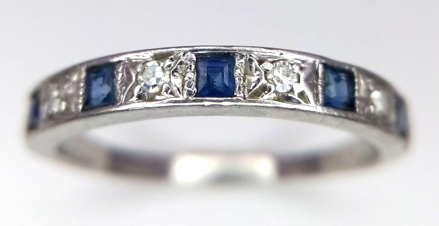 9k white gold diamond and sapphire half eternity ring. Weight: 3.1g Size O (dia:0.08ct/sapp:0.35ct) - Image 2 of 3