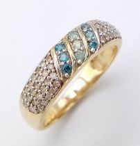 A 9K YELLOW GOLD WHITE AND COLOURED DIAMOND RING. Size N, 0.35ctw, 2.9g total weight.