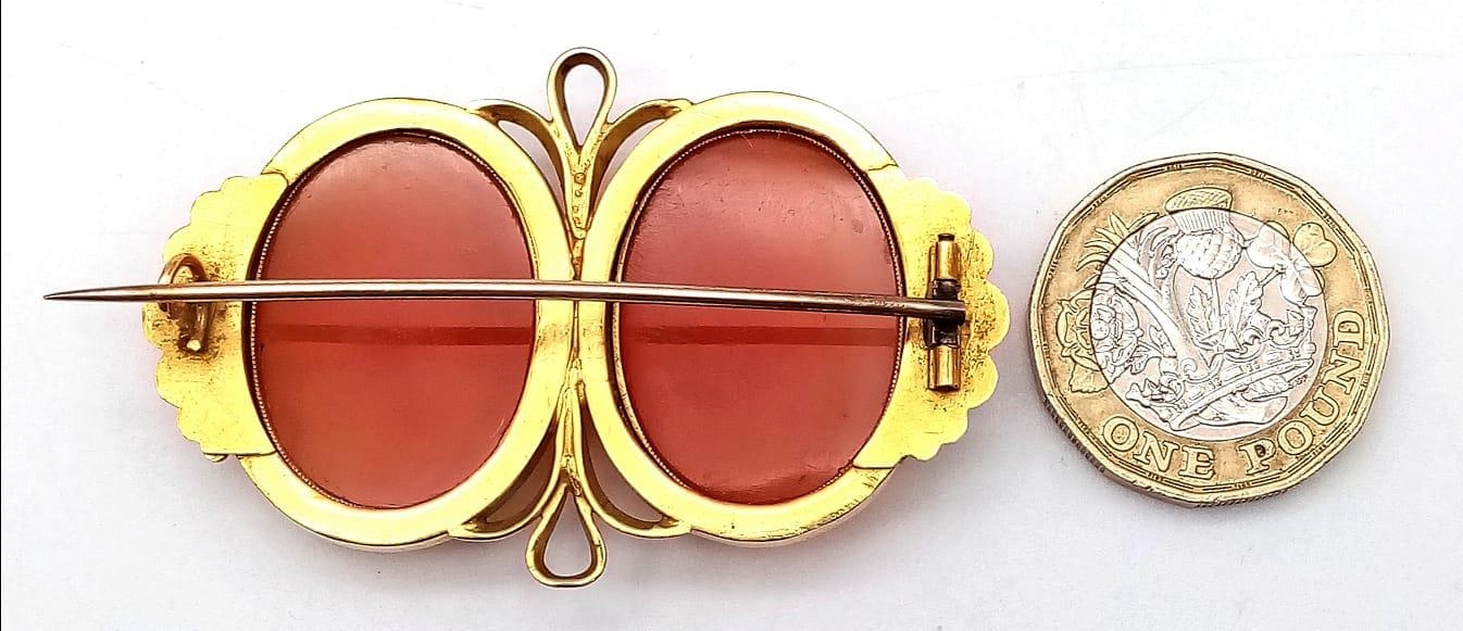 An Antique 18K Yellow Gold (tested) and Carnelian Brooch. Two rich orange cabochons of carnelian set - Image 4 of 4