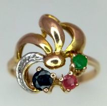 A 9K Yellow Gold Mixed Gemstone Ring. Emerald, ruby, sapphire and diamond. Size O. 2.26g total