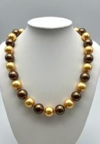 An Exotic Metallic Gold and Brown South Sea Pearl Shell Necklace. 14mm beads. Necklace length -