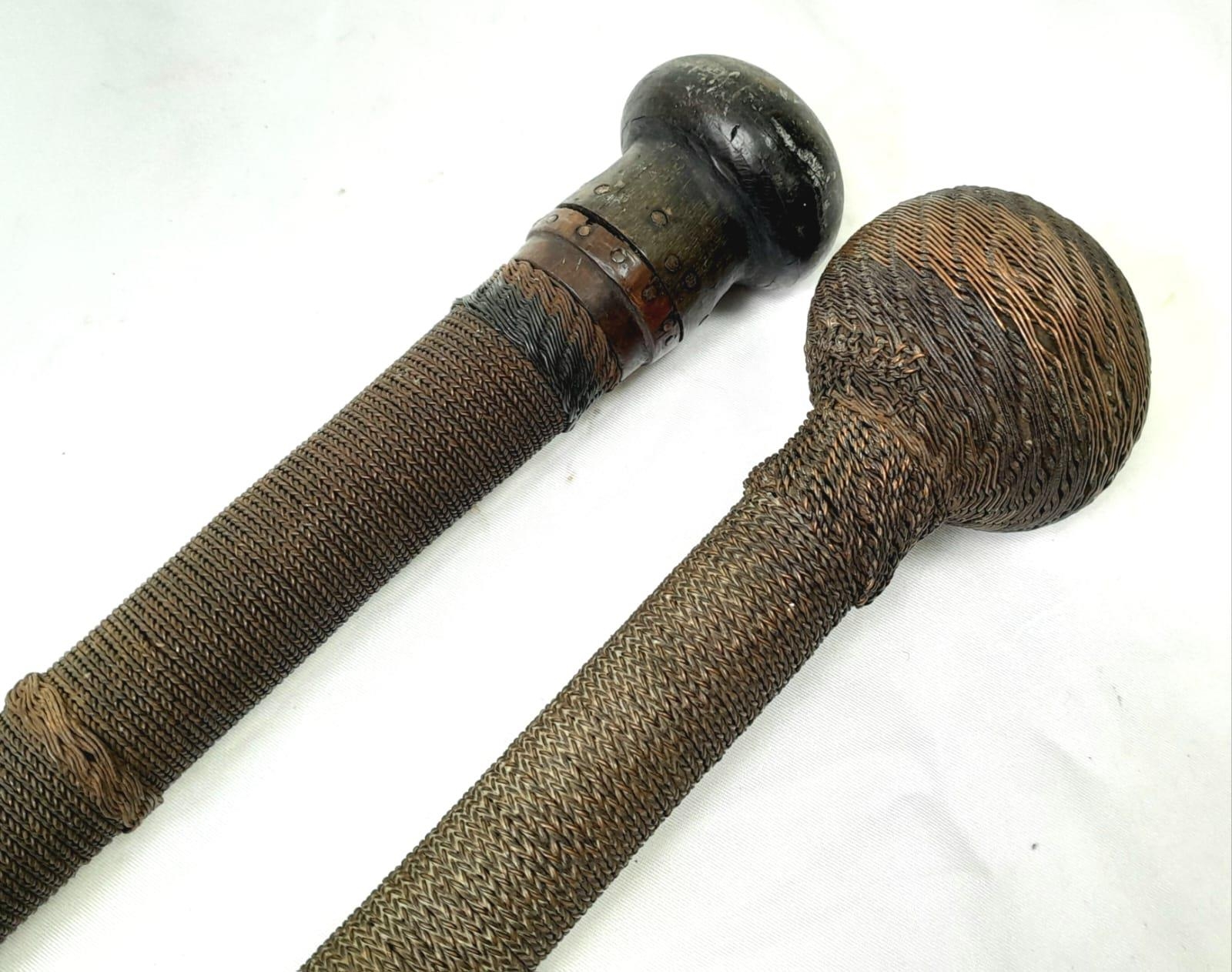 Two Antique Asian Wooden Walking Sticks With Wire Woven Exterior. Metal Handled Stick Measures - Image 2 of 3