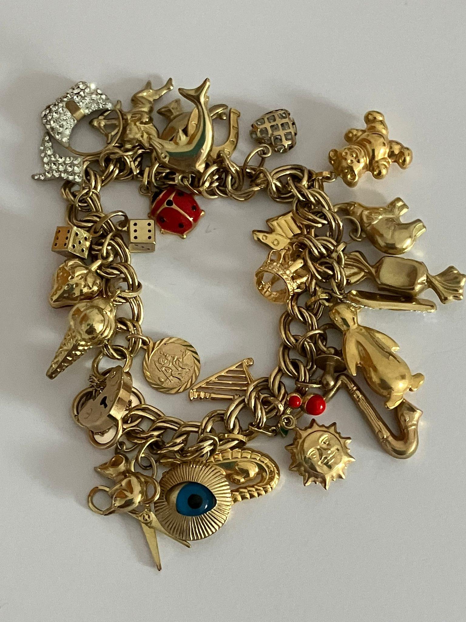 9 carat GOLD CHARM BRACELET Absolutely full of Gold charms, To include Dolphin, Ladybird, Magic - Image 6 of 6