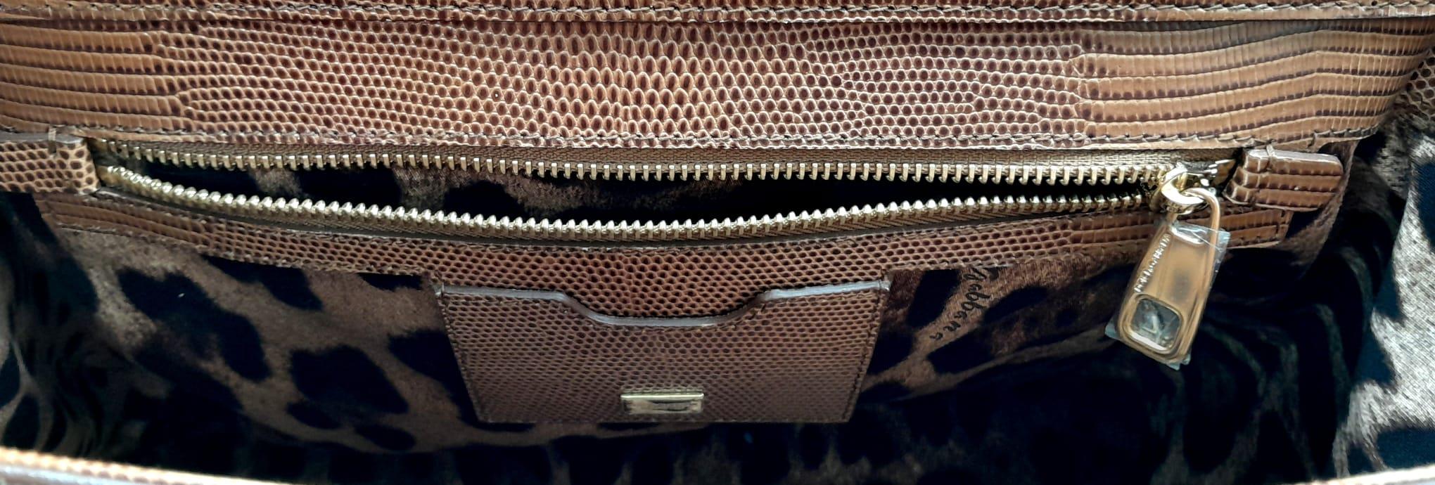 A Dolce & Gabbana Brown 'Monica' Bag. Lizard embossed leather exterior, with a single handle and - Image 13 of 16