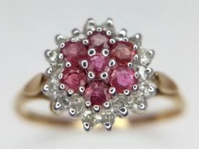 9k yellow gold diamond and ruby cluster ring. Weight: 1.8g Size P (dia: 0.18ct/ruby:0.35ct)