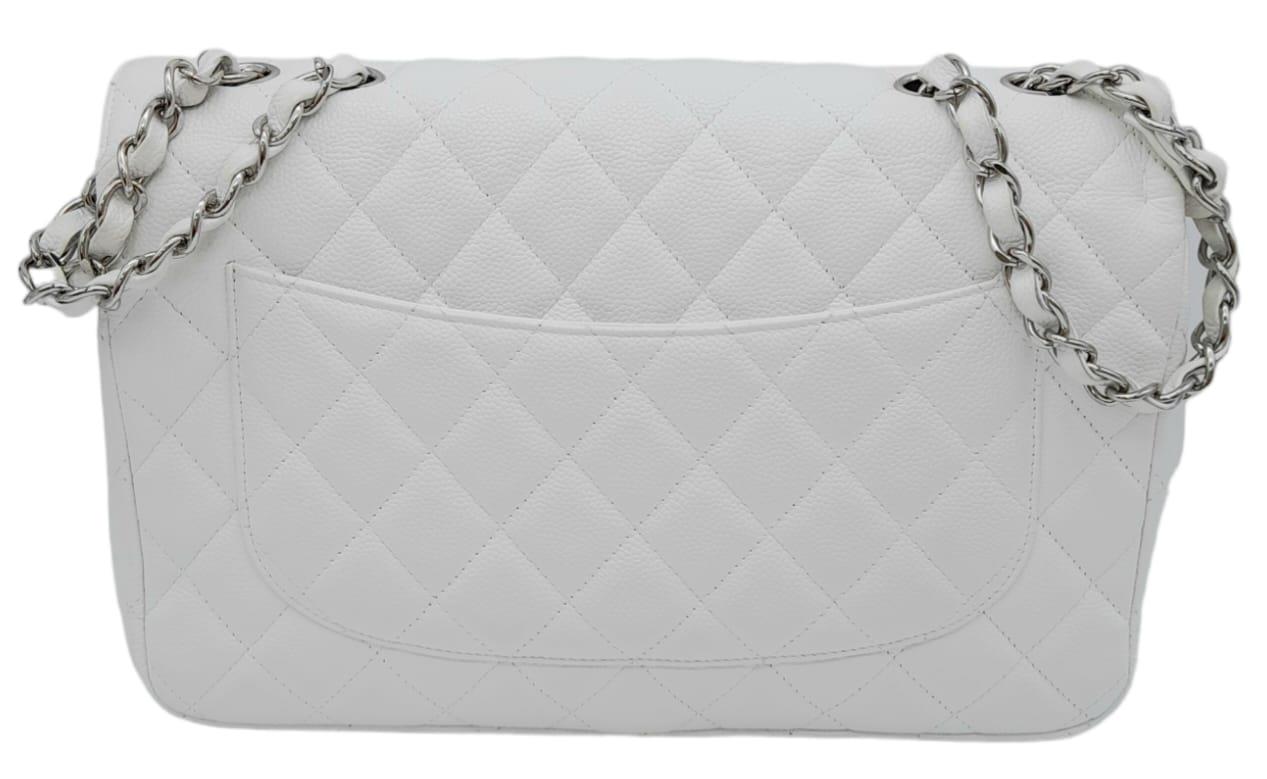 An exquisite Chanel White Caviar Classic Flap Bag. The interior is lined in a tonal leather, care - Image 6 of 11