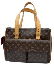 A Louis Vuitton Monogram Multiple Cite Bag. Leather exterior with gold hardware and top zip. Two