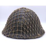 Korean War Era British Mk III Helmet. 1945 Dated Liner. Insignia of the Gloucestershire Regiment