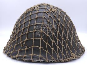 Korean War Era British Mk III Helmet. 1945 Dated Liner. Insignia of the Gloucestershire Regiment