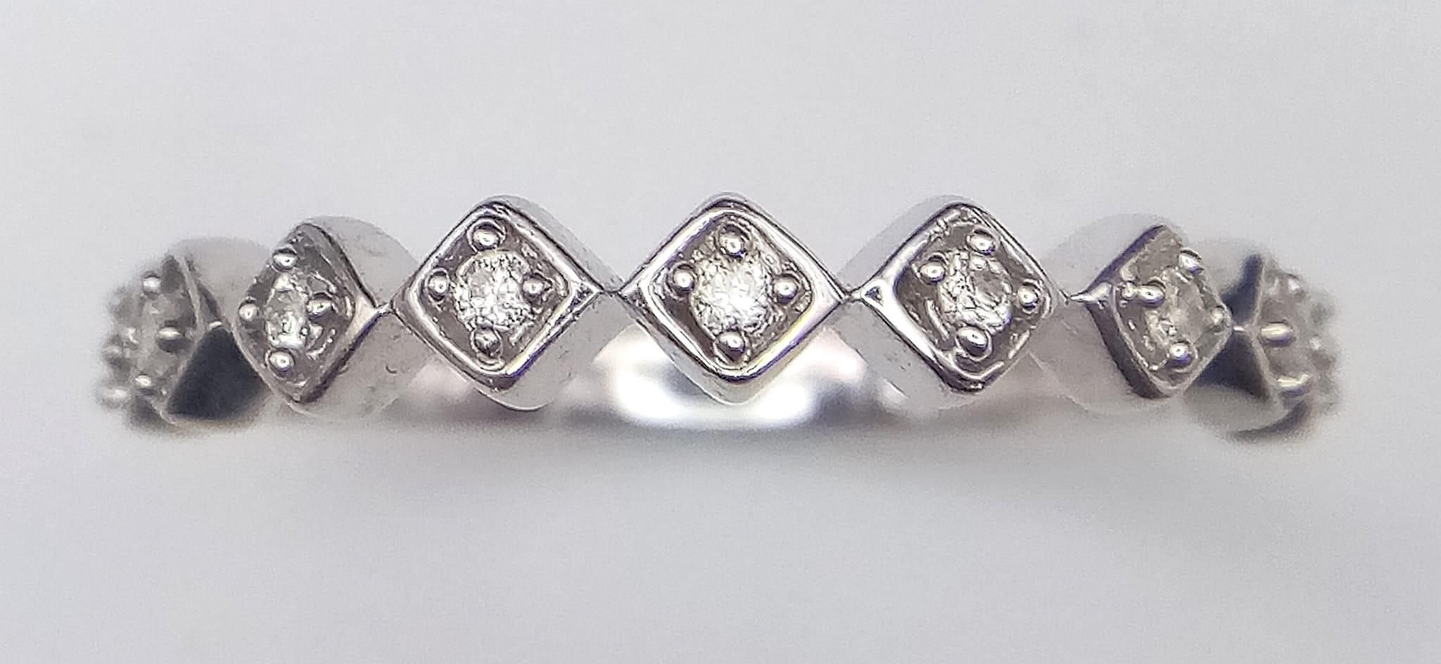 A 9K WHITE GOLD DIAMOND SET BAND RING, 9 round cut diamonds 1.9G SIZE N 1/2 - Image 3 of 5