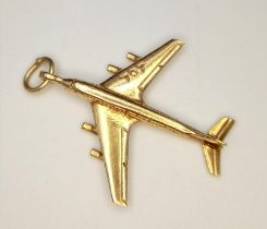 A 14K YELLOW GOLD AEROPLANE BOEING 707 CHARM/PENDANT. 27mm length, 2.8g total weight.